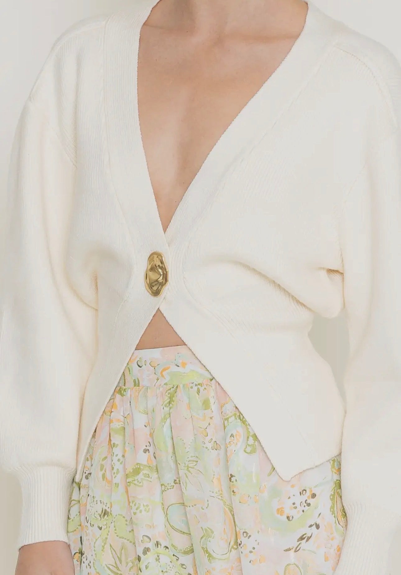 ONE GOLD BUTTON CARDI