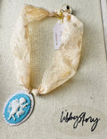 Vintage lace and Resin Cameo Pendant