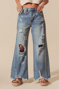 Mid Rise Destructed and Distressed Denim Jeans