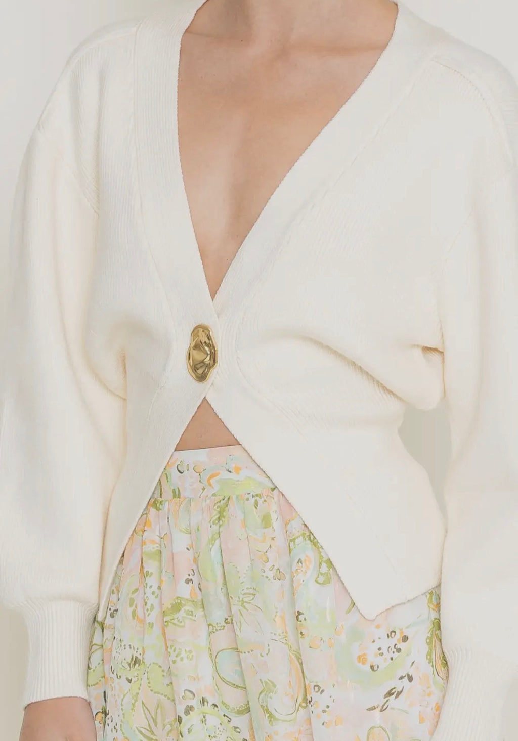ONE GOLD BUTTON CARDI