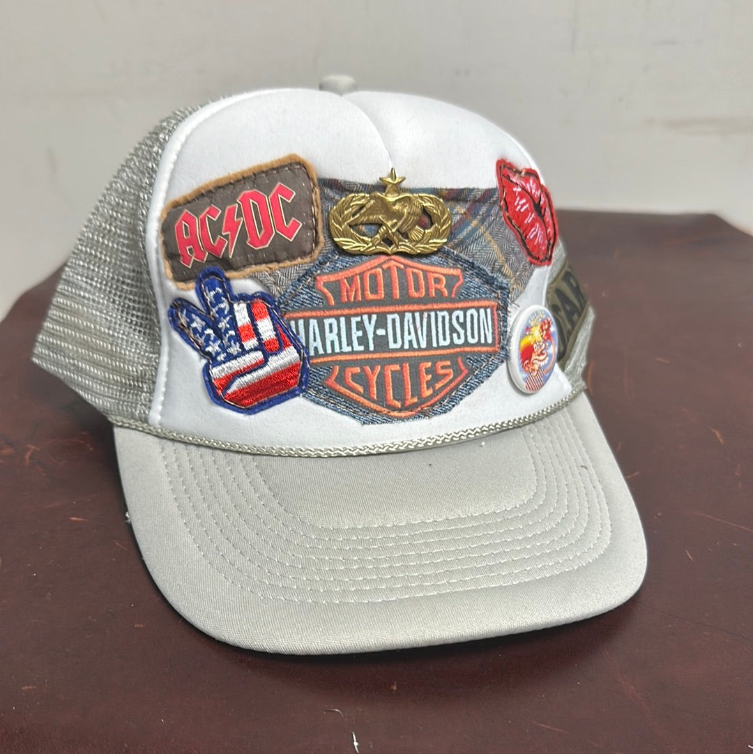 LIBBY STORY HARLEY ROCK TRUCKER HAT