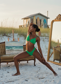 SCENE CONTEXT:
STUDIO SETTING: Editorial fashion photography of a young creative woman on a secluded