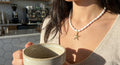 AI Editorial - Swirl Starfish Pendant Oval Beaded Necklace