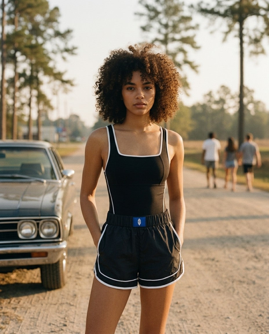 [AI-GEN] Free People Varsity Blues Runsie