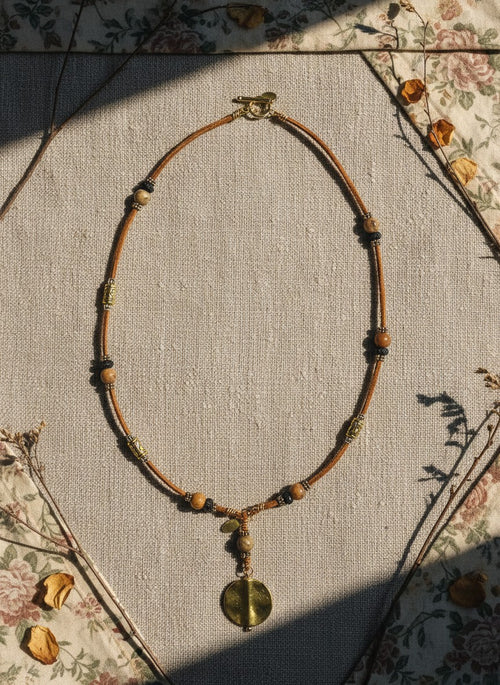 [AI-GEN] Handmade Leather & Bone Lariat Necklace