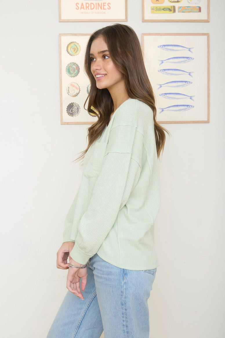 Split Neck Raw Edge Long Sleeve Ribbed Top